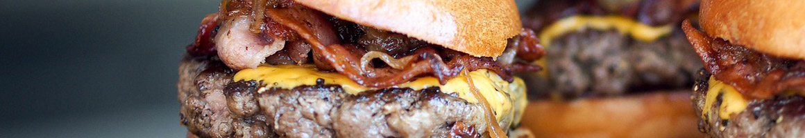 Eating Burger at Twins Sliders restaurant in Los Angeles, CA.